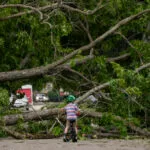 Misery in Houston with power out and heat rising; Kansas faces wind risk