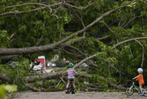 Misery in Houston with power out and heat rising; Kansas faces wind risk